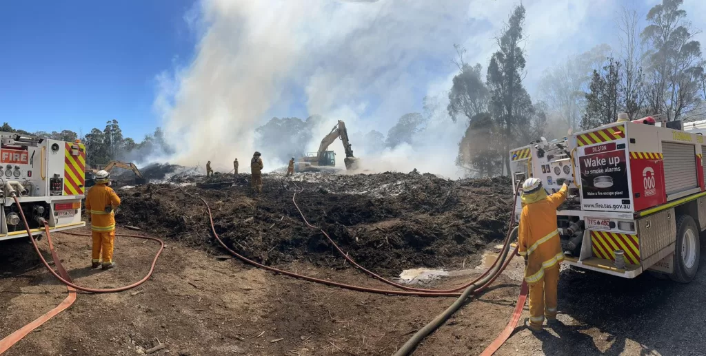 Crews from TFS working on the large mulch fire on day 2