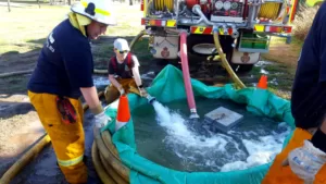 Tamworth firefighters demonstrating the hose coil